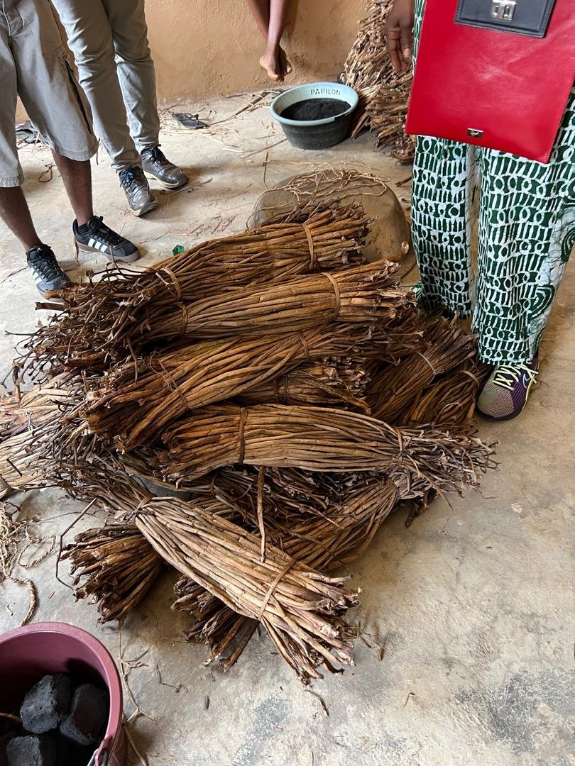 Dried water hyacinths sorted into stacks
