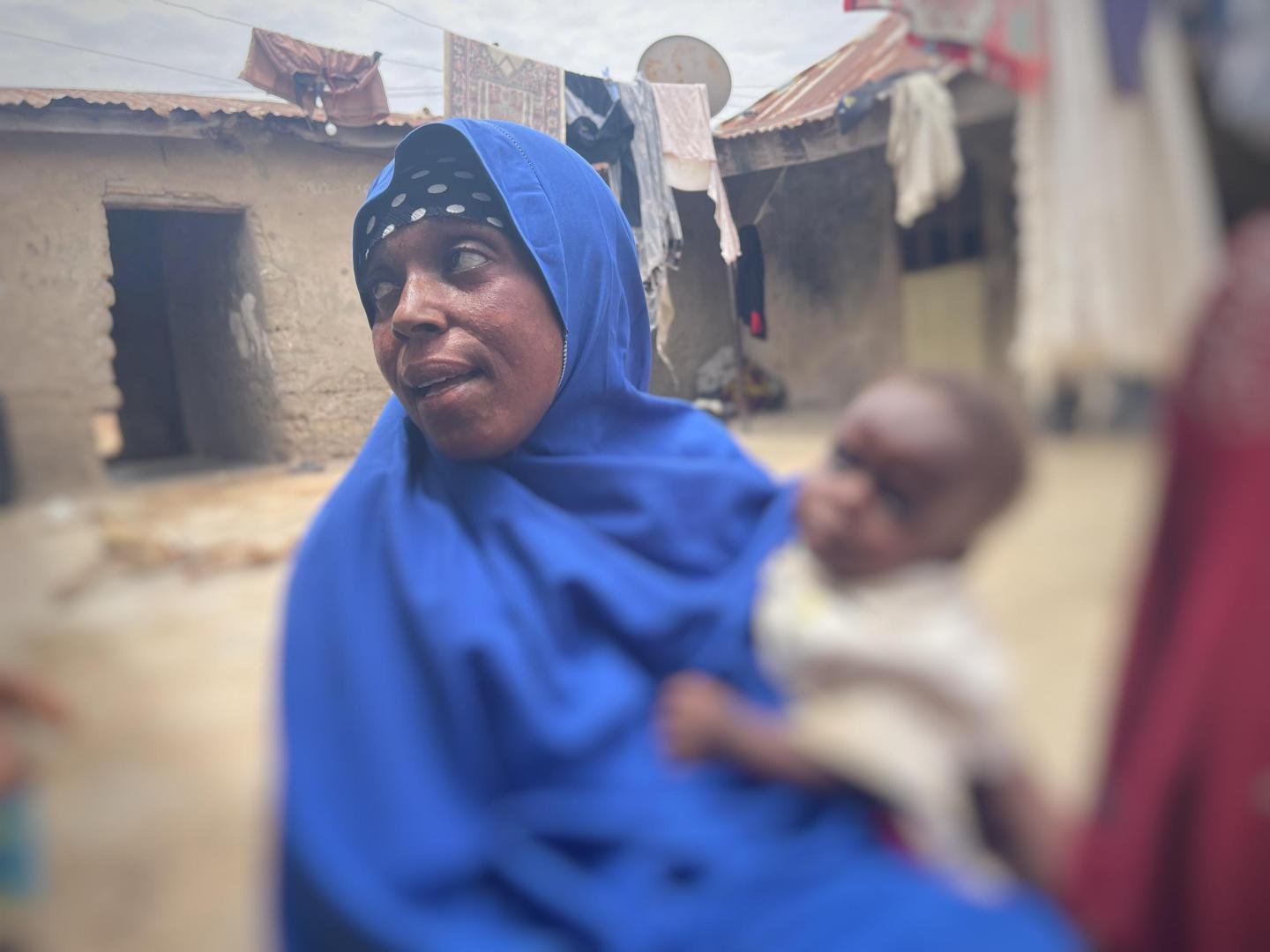 Hassana Isah and her son (PHOTO CREDIT: Ayodeji )