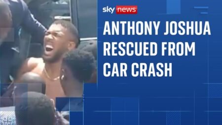 Footage shows Anthony Joshua being helped from car after crash in Nigeria