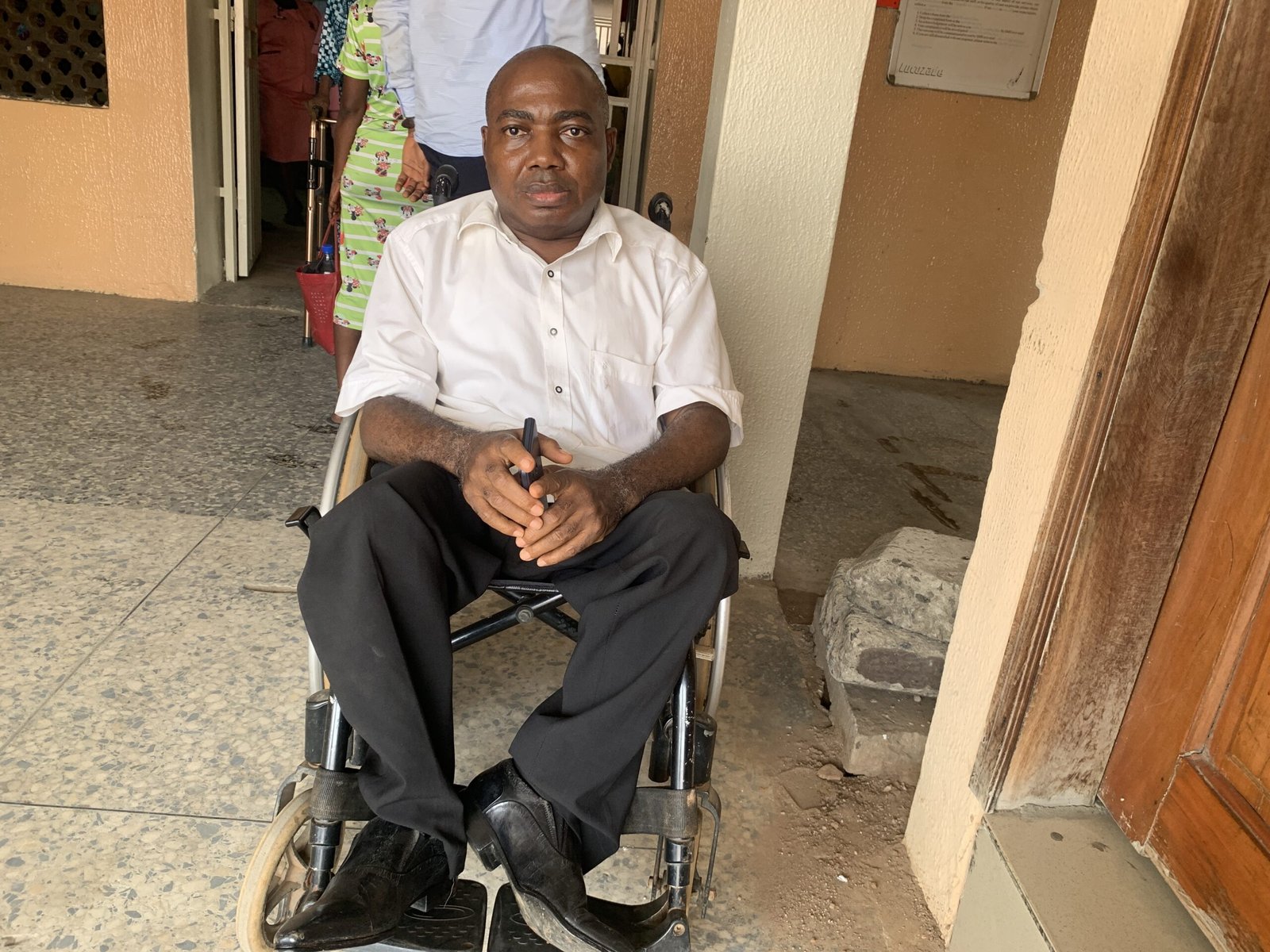 Paul Igbede, an outpatient waiting in the hospital corridor for his wife to get his drugs outside LASUTH