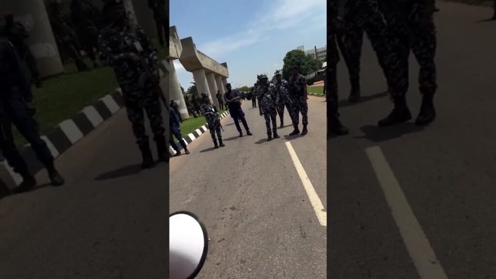 Protesters DARE Police To Fire Tear Gas During Abuja Protest.