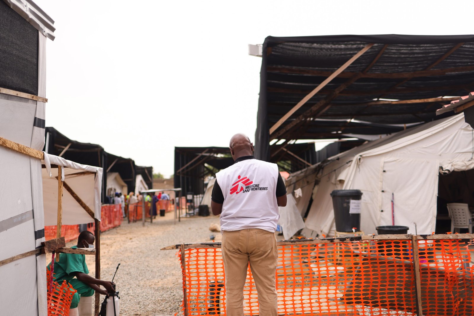 MSF infection prevention and control manager James Moriea standing at the entrance of the wards of the cholera treatment centre run by MSF in collaboration with the State Ministry of Health in Ngarannam, in Maiduguri, Borno state. ยฉMerel van de Geyn/MSF