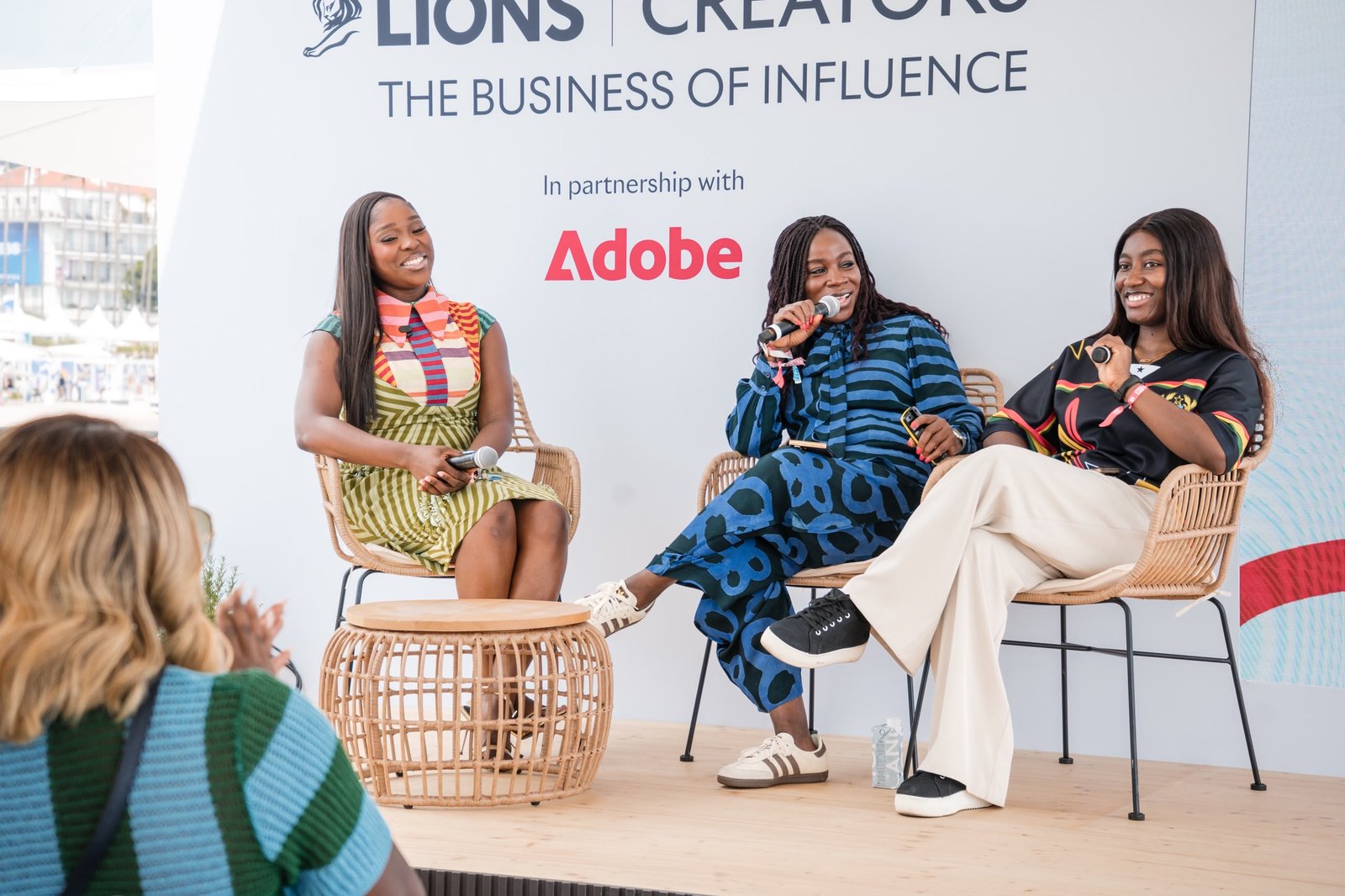 L-R: Media Personality, Actor & Entrepreneur, Tomike Adeoye; Founder & Creative Director, Woof Studios Africa, Adetutu has Laditan; Sports Creator & Digital Influencer, Bernice Boakye Ansah speaking at the Cannes Creators Beach