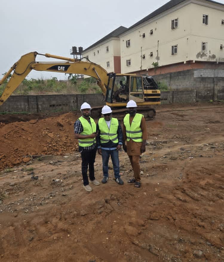 A photo of a portion of the land with workers on it