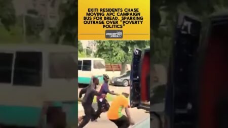 EKITI RESIDENTS CHASE MOVING APC CAMPAIGN BUS FOR BREAD. #nigeria #news #apc #campaign EKITI RESIDENTS CHASE MOVING APC CAMPAIGN BUS FOR BREAD. #nigeria #news #apc #campaign